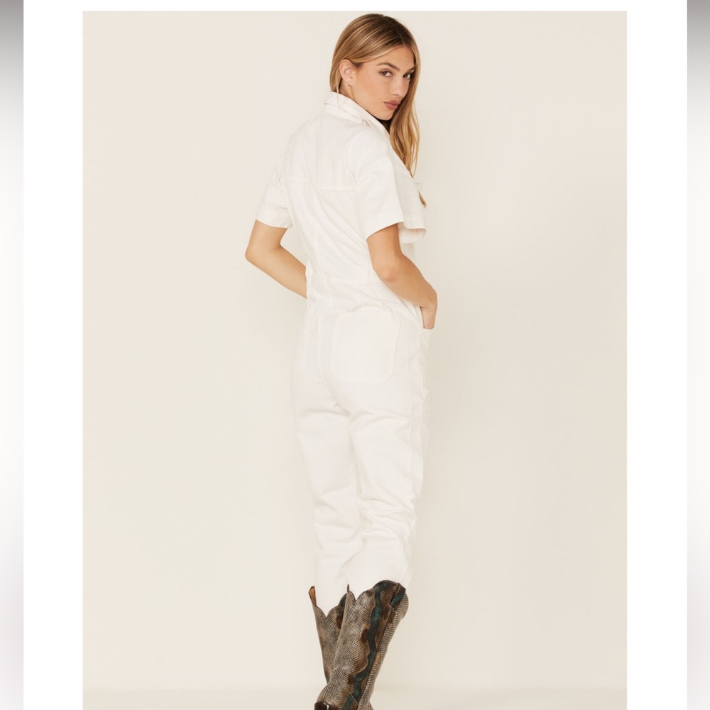 NWT, Free People white large jumpsuit.